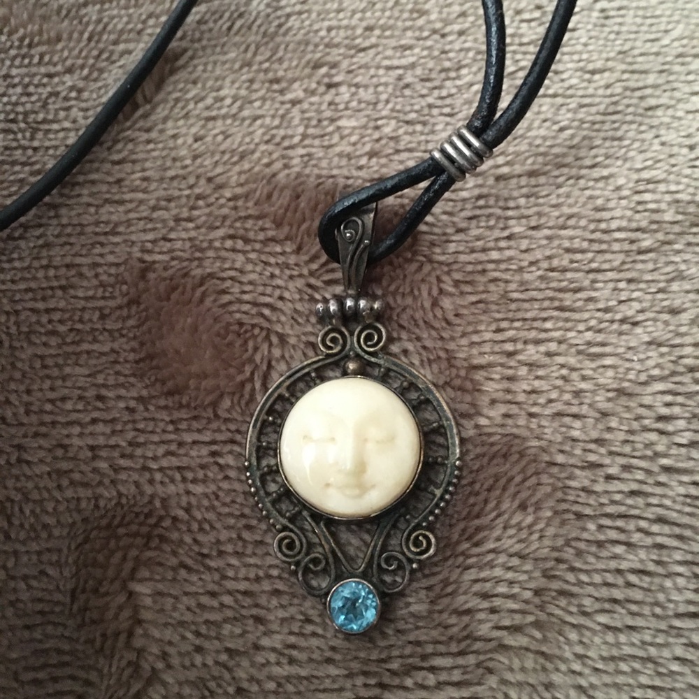 Moon pendant with blue topaz